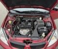 Красный Мицубиси Лансер, объемом двигателя 1.6 л и пробегом 285 тыс. км за 3650 $, фото 15 на Automoto.ua