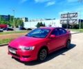 Красный Мицубиси Лансер, объемом двигателя 1.5 л и пробегом 135 тыс. км за 6700 $, фото 1 на Automoto.ua