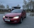 Красный Мицубиси Лансер, объемом двигателя 1.6 л и пробегом 280 тыс. км за 4650 $, фото 1 на Automoto.ua