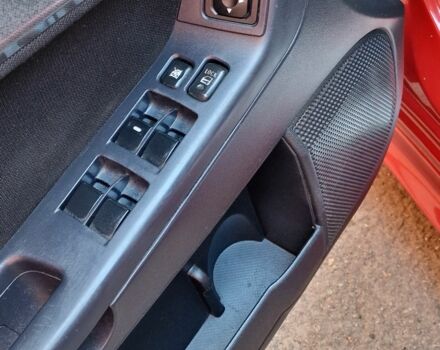 Красный Мицубиси Лансер, объемом двигателя 2 л и пробегом 274 тыс. км за 6000 $, фото 6 на Automoto.ua