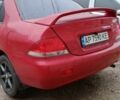 Красный Мицубиси Лансер, объемом двигателя 1.6 л и пробегом 155 тыс. км за 2000 $, фото 1 на Automoto.ua