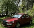 Червоний Міцубісі Lancer, об'ємом двигуна 1.5 л та пробігом 214 тис. км за 6150 $, фото 3 на Automoto.ua