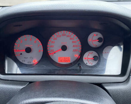 Червоний Міцубісі Lancer, об'ємом двигуна 1.58 л та пробігом 151 тис. км за 5600 $, фото 20 на Automoto.ua