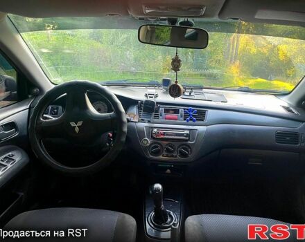 Червоний Міцубісі Lancer, об'ємом двигуна 1.6 л та пробігом 185 тис. км за 3900 $, фото 8 на Automoto.ua