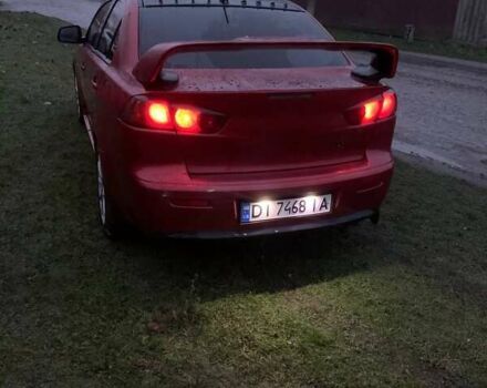 Красный Мицубиси Лансер, объемом двигателя 1.5 л и пробегом 241 тыс. км за 5850 $, фото 2 на Automoto.ua