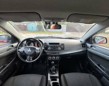 Червоний Міцубісі Lancer, об'ємом двигуна 2 л та пробігом 191 тис. км за 7200 $, фото 3 на Automoto.ua