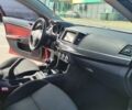 Красный Мицубиси Лансер, объемом двигателя 2 л и пробегом 170 тыс. км за 7500 $, фото 14 на Automoto.ua