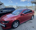 Червоний Міцубісі Lancer, об'ємом двигуна 2 л та пробігом 254 тис. км за 7500 $, фото 2 на Automoto.ua