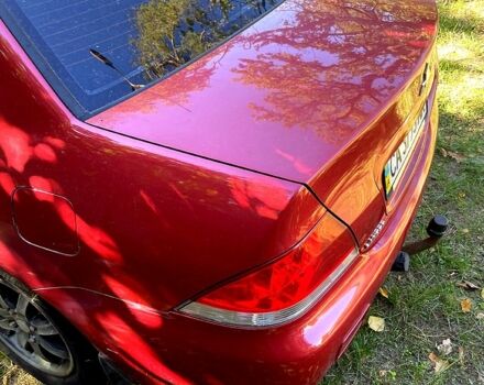 Красный Мицубиси Лансер, объемом двигателя 1.6 л и пробегом 344 тыс. км за 4000 $, фото 2 на Automoto.ua