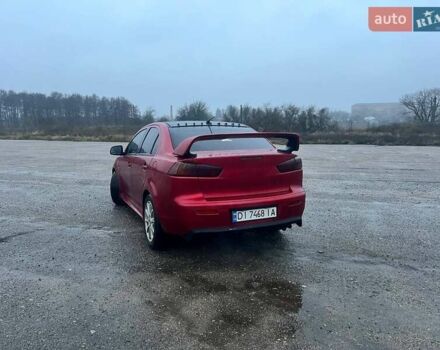 Красный Мицубиси Лансер, объемом двигателя 1.5 л и пробегом 241 тыс. км за 5850 $, фото 4 на Automoto.ua