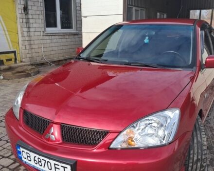 Мицубиси Лансер 2007 в Нежине на Automoto.ua Красный Мицубиси Лансер, объемом двигателя 2 л и пробегом 200 тыс. км за 5500 $, фото 1 на Automoto.ua