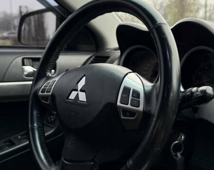 Красный Мицубиси Лансер, объемом двигателя 2 л и пробегом 261 тыс. км за 7200 $, фото 15 на Automoto.ua