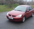 Красный Мицубиси Лансер, объемом двигателя 1.6 л и пробегом 250 тыс. км за 3700 $, фото 1 на Automoto.ua