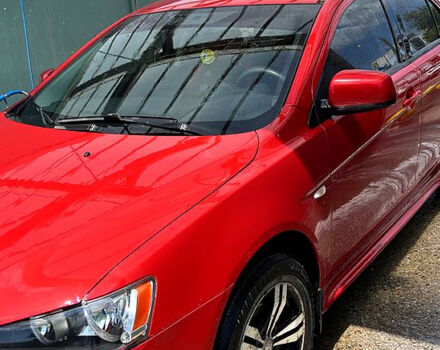 Красный Мицубиси Лансер, объемом двигателя 1.5 л и пробегом 145 тыс. км за 6500 $, фото 2 на Automoto.ua