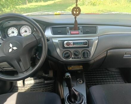 Красный Мицубиси Лансер, объемом двигателя 0 л и пробегом 221 тыс. км за 5500 $, фото 7 на Automoto.ua