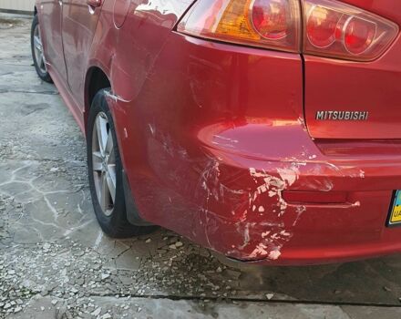 Красный Мицубиси Лансер, объемом двигателя 2 л и пробегом 406 тыс. км за 2750 $, фото 7 на Automoto.ua