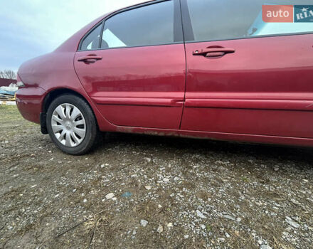 Красный Мицубиси Лансер, объемом двигателя 1.58 л и пробегом 280 тыс. км за 3250 $, фото 6 на Automoto.ua