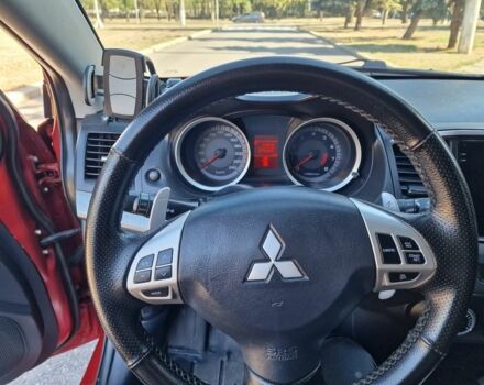 Мицубиси Лансер 2007 в Николаеве на Automoto.ua Красный Мицубиси Лансер, объемом двигателя 2 л и пробегом 275 тыс. км за 6200 $, фото 7 на Automoto.ua