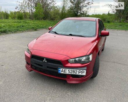 Червоний Міцубісі Lancer, об'ємом двигуна 2 л та пробігом 175 тис. км за 7000 $, фото 16 на Automoto.ua