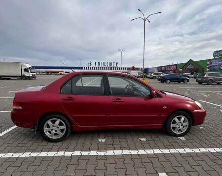 Красный Мицубиси Лансер, объемом двигателя 1.6 л и пробегом 176 тыс. км за 4300 $, фото 3 на Automoto.ua