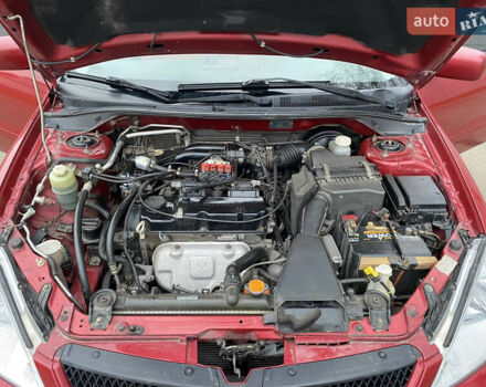 Червоний Міцубісі Lancer, об'ємом двигуна 1.58 л та пробігом 151 тис. км за 5600 $, фото 16 на Automoto.ua