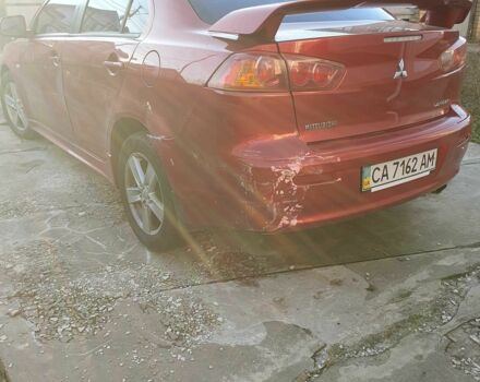 Красный Мицубиси Лансер, объемом двигателя 2 л и пробегом 406 тыс. км за 2750 $, фото 6 на Automoto.ua