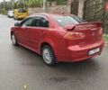 Червоний Міцубісі Lancer, об'ємом двигуна 2 л та пробігом 186 тис. км за 5600 $, фото 9 на Automoto.ua