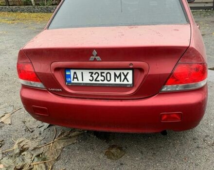 Червоний Міцубісі Lancer, об'ємом двигуна 1.6 л та пробігом 300 тис. км за 2799 $, фото 4 на Automoto.ua