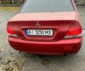 Червоний Міцубісі Lancer, об'ємом двигуна 1.6 л та пробігом 300 тис. км за 2799 $, фото 4 на Automoto.ua
