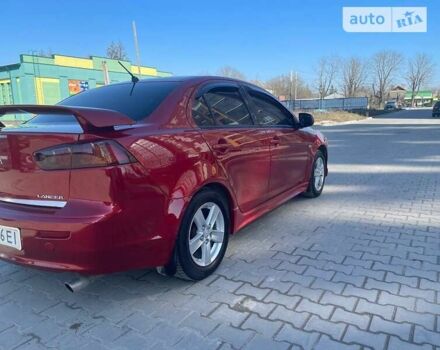 Червоний Міцубісі Lancer, об'ємом двигуна 2 л та пробігом 293 тис. км за 7350 $, фото 11 на Automoto.ua