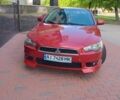 Червоний Міцубісі Lancer, об'ємом двигуна 2 л та пробігом 156 тис. км за 6999 $, фото 1 на Automoto.ua