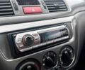 Мицубиси Лансер 2007 в Киеве на Automoto.ua Красный Мицубиси Лансер, объемом двигателя 1.6 л и пробегом 212 тыс. км за 5490 $, фото 17 на Automoto.ua