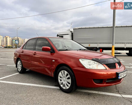 Червоний Міцубісі Lancer, об'ємом двигуна 1.6 л та пробігом 194 тис. км за 5500 $, фото 16 на Automoto.ua