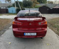Червоний Міцубісі Lancer, об'ємом двигуна 2 л та пробігом 191 тис. км за 7200 $, фото 2 на Automoto.ua