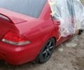 Красный Мицубиси Лансер, объемом двигателя 1.6 л и пробегом 155 тыс. км за 2000 $, фото 4 на Automoto.ua