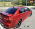 Червоний Міцубісі Lancer, об'ємом двигуна 2 л та пробігом 251 тис. км за 5900 $, фото 8 на Automoto.ua