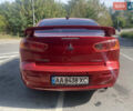 Червоний Міцубісі Lancer, об'ємом двигуна 2 л та пробігом 251 тис. км за 5900 $, фото 6 на Automoto.ua