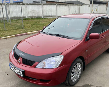 Червоний Міцубісі Lancer, об'ємом двигуна 1.58 л та пробігом 151 тис. км за 5600 $, фото 2 на Automoto.ua