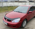 Червоний Міцубісі Lancer, об'ємом двигуна 1.58 л та пробігом 151 тис. км за 5600 $, фото 2 на Automoto.ua