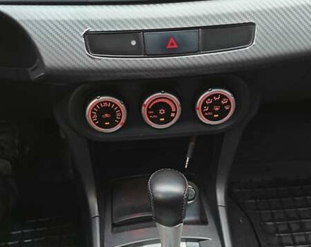 Червоний Міцубісі Lancer, об'ємом двигуна 2 л та пробігом 187 тис. км за 5500 $, фото 20 на Automoto.ua