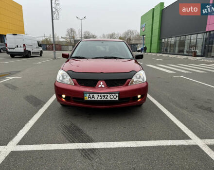 Красный Мицубиси Лансер, объемом двигателя 1.58 л и пробегом 285 тыс. км за 3650 $, фото 3 на Automoto.ua