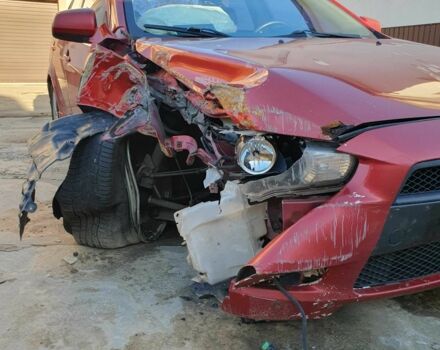 Красный Мицубиси Лансер, объемом двигателя 2 л и пробегом 406 тыс. км за 2750 $, фото 8 на Automoto.ua