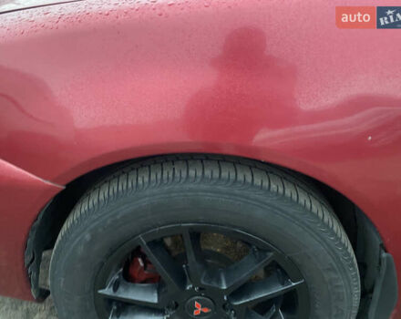 Красный Мицубиси Лансер, объемом двигателя 1.58 л и пробегом 269 тыс. км за 3899 $, фото 10 на Automoto.ua