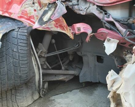 Красный Мицубиси Лансер, объемом двигателя 2 л и пробегом 406 тыс. км за 2750 $, фото 9 на Automoto.ua