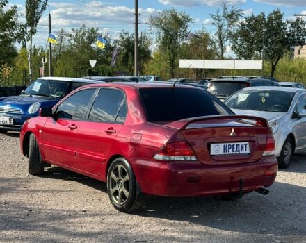 Красный Мицубиси Лансер, объемом двигателя 1.6 л и пробегом 230 тыс. км за 5300 $, фото 3 на Automoto.ua