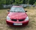 Червоний Міцубісі Lancer, об'ємом двигуна 1.6 л та пробігом 188 тис. км за 3912 $, фото 1 на Automoto.ua