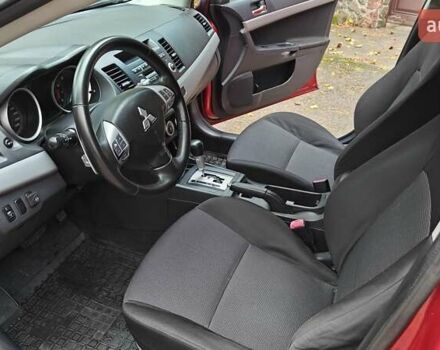 Червоний Міцубісі Lancer, об'ємом двигуна 2 л та пробігом 187 тис. км за 5500 $, фото 13 на Automoto.ua