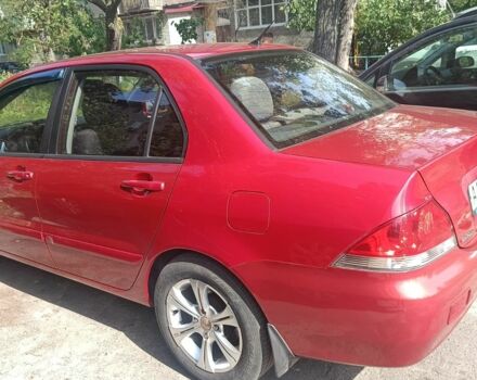 Красный Мицубиси Лансер, объемом двигателя 0 л и пробегом 221 тыс. км за 5500 $, фото 2 на Automoto.ua