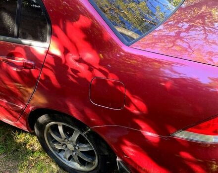 Красный Мицубиси Лансер, объемом двигателя 1.6 л и пробегом 344 тыс. км за 4000 $, фото 3 на Automoto.ua