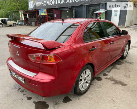 Червоний Міцубісі Lancer, об'ємом двигуна 2 л та пробігом 175 тис. км за 7000 $, фото 26 на Automoto.ua